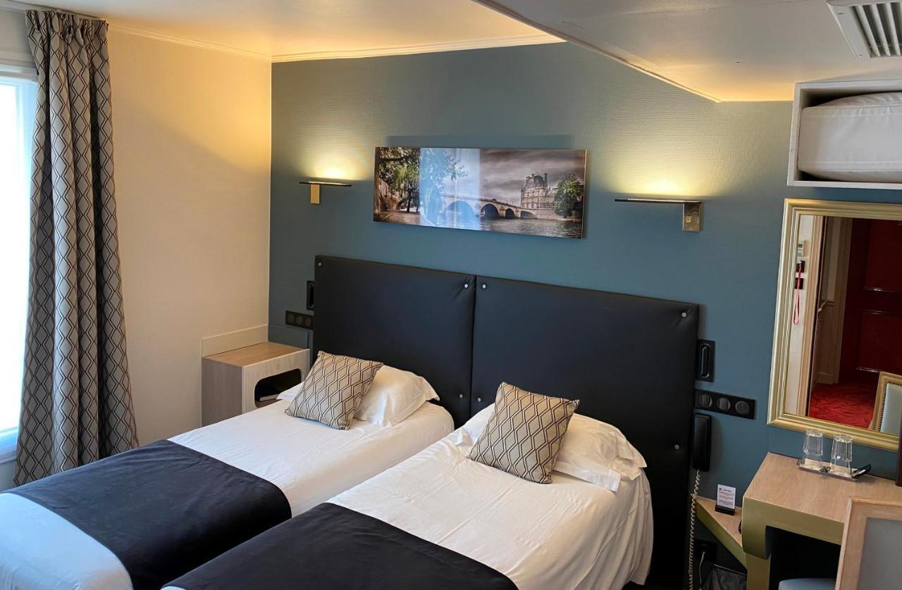 Hotel Louvre Sainte Anne Paris Bagian luar foto
